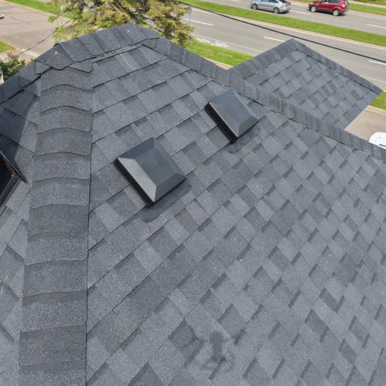 Finished architectural shingle roof from the air