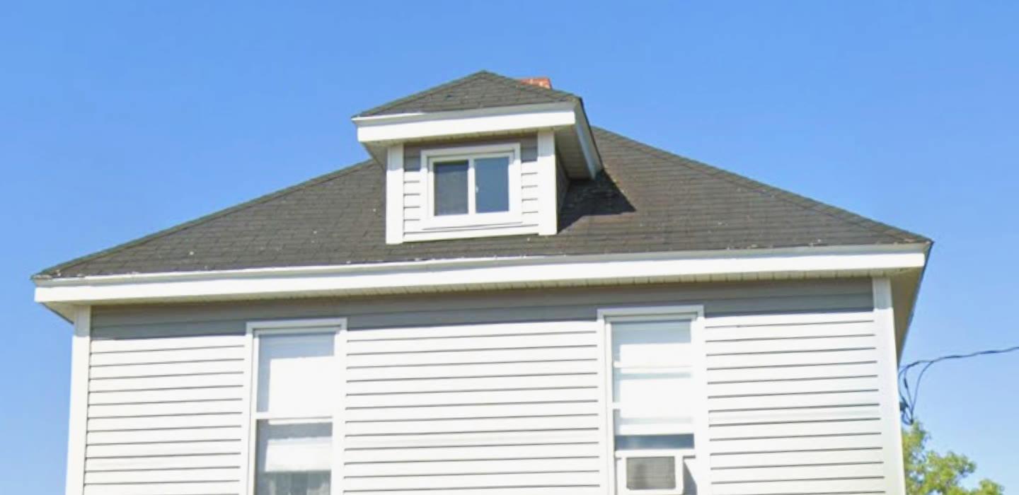 The same Moncton roof before, faded worn shingles