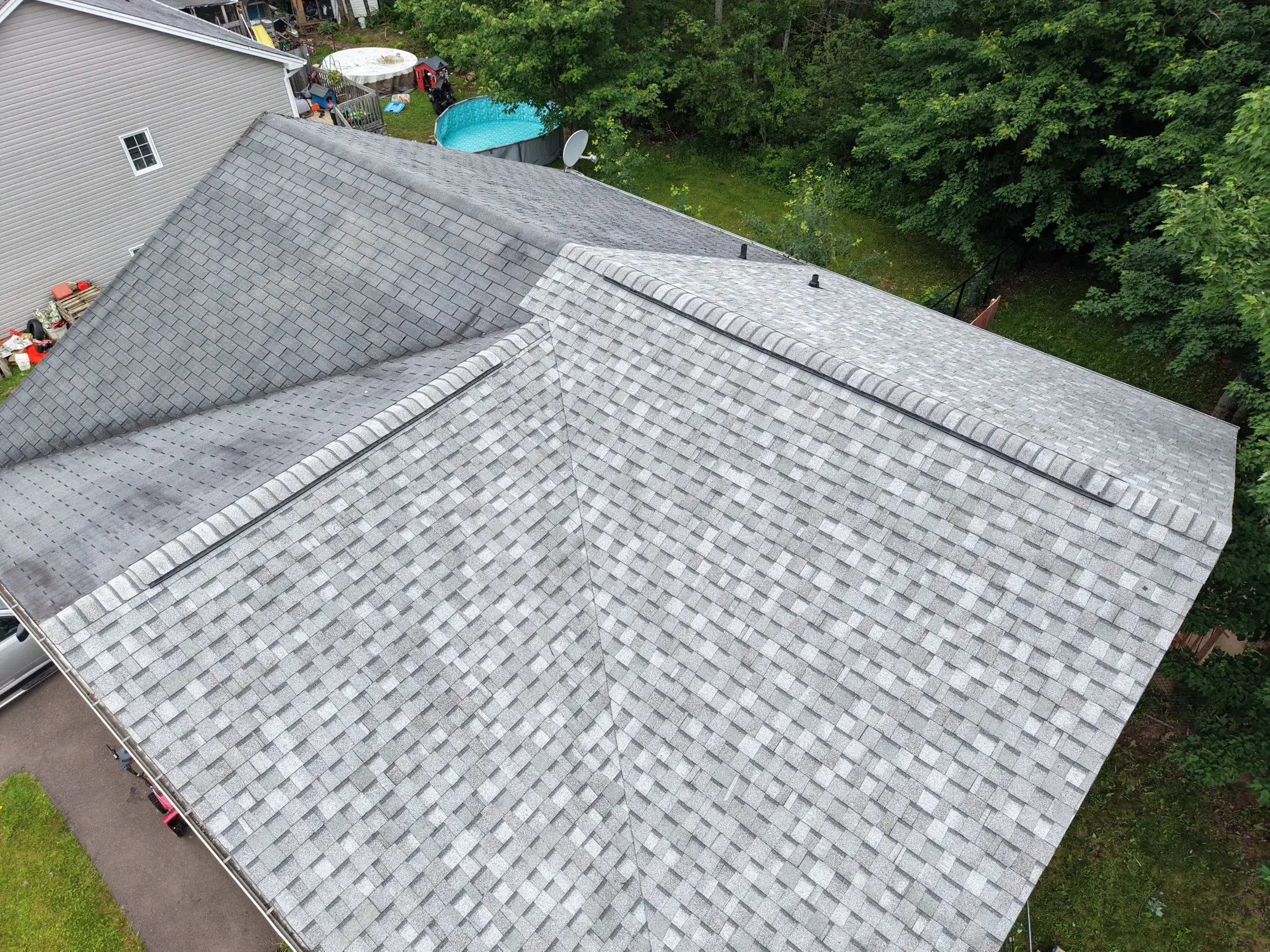 Aerial drone view of the finished roof in Moncton, the same view we measure from