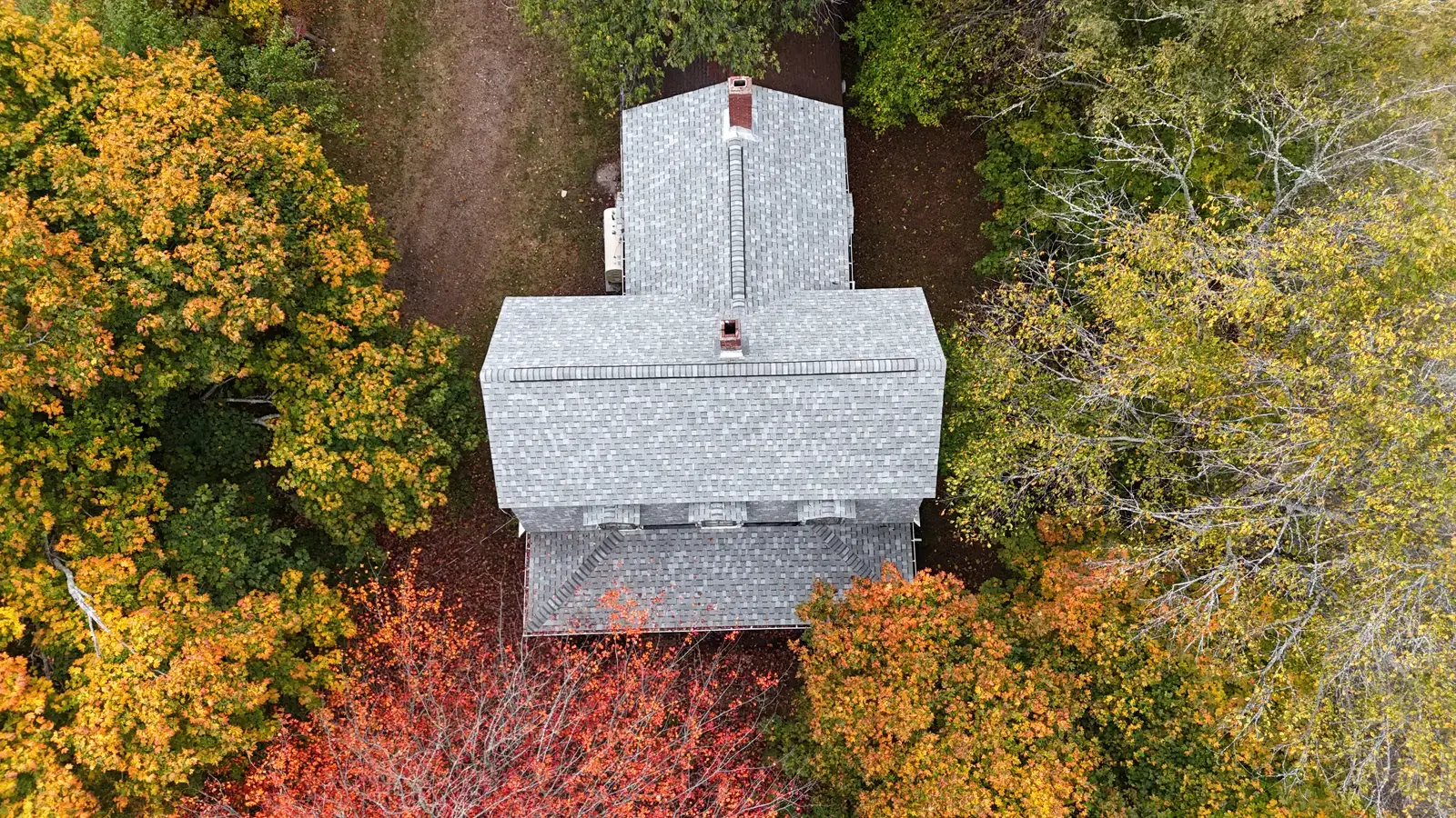 Straight-down drone view of the finished roof in New Brunswick, the same view we measure from